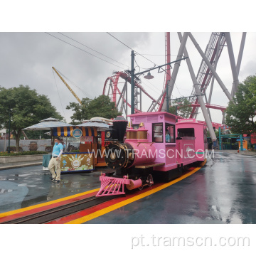 Trem de trilha de parque de diversões rosa